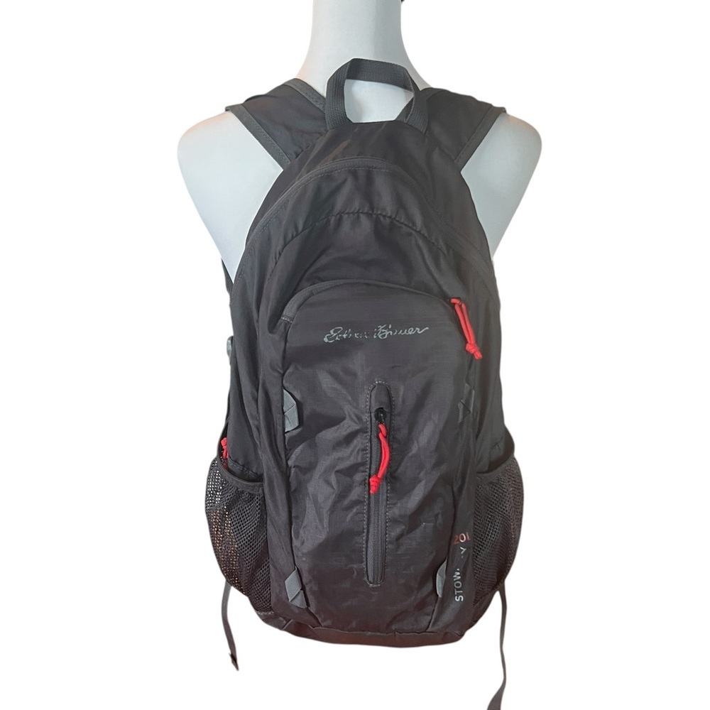 EDDIE BAUER STOWAWAY PACKABLE 20L BACKPACK in black with red piping
